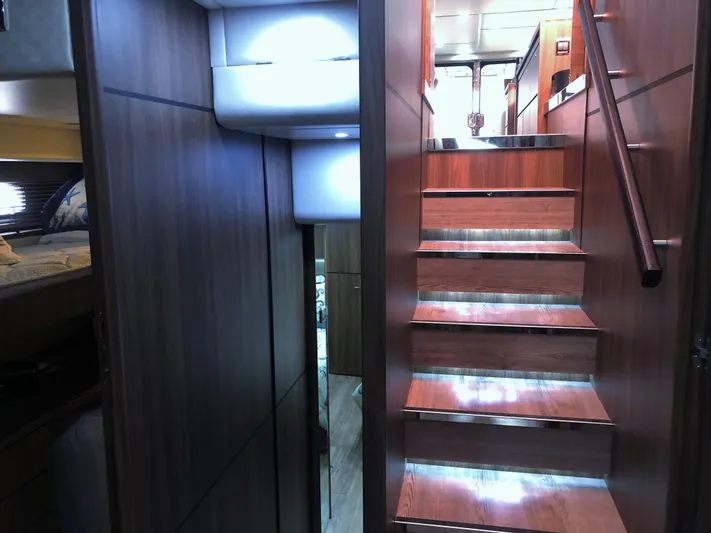  Yacht Photos Pics Interior of 2007 Fairline Squadron 68 yacht with wooden stairs and modern design.