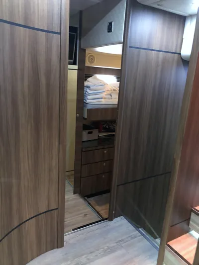  Yacht Photos Pics Interior of 2007 Fairline Squadron 68 yacht with wooden cabinetry and modern design.