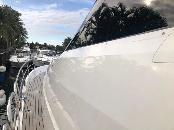  Yacht Photos Pics 2007 Fairline Squadron 68 yacht docked, showcasing sleek design and polished exterior.