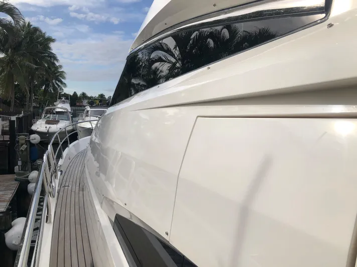  Yacht Photos Pics 2007 Fairline Squadron 68 yacht docked, showcasing sleek design and polished exterior.