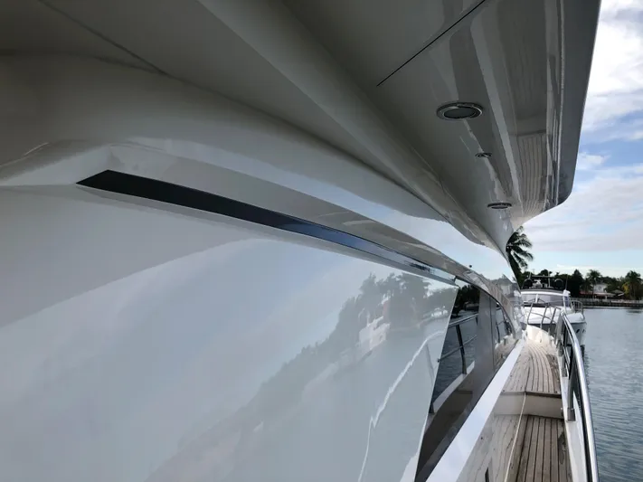  Yacht Photos Pics 2007 Fairline Squadron 68 yacht, sleek exterior design, docked by the water.