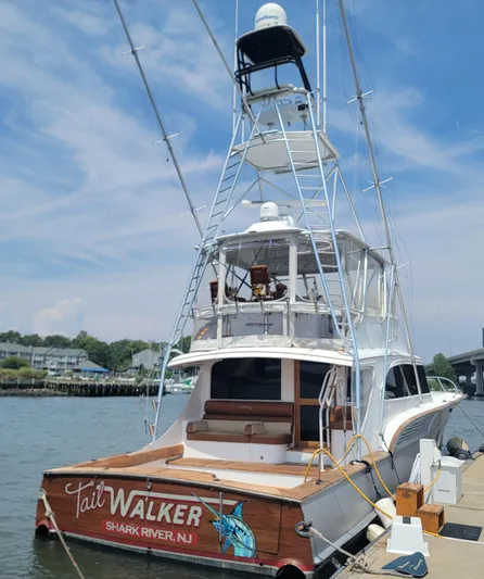  Yacht Photos Pics 1998 Buddy Davis 65 Carolina Custom yacht docked, featuring "Tail Walker" signage, Shark River, NJ.