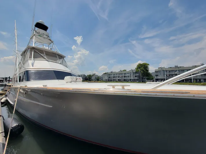  Yacht Photos Pics 1998 Buddy Davis 65 Carolina Custom yacht docked under a clear blue sky.