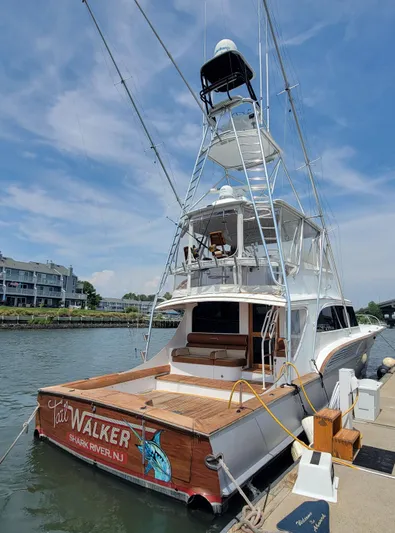  Yacht Photos Pics 1998 Buddy Davis 65 Carolina Custom yacht docked at marina under clear sky.