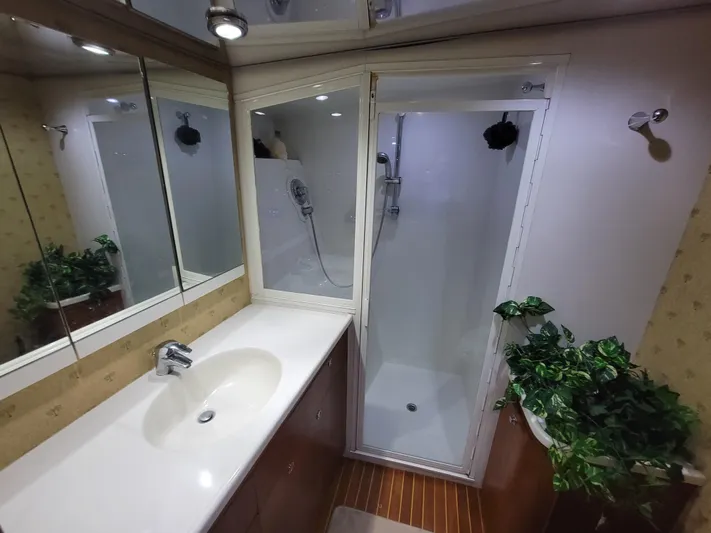 Yacht Photos Pics Bathroom interior of 1998 Buddy Davis 65 Carolina Custom yacht with shower and sink.