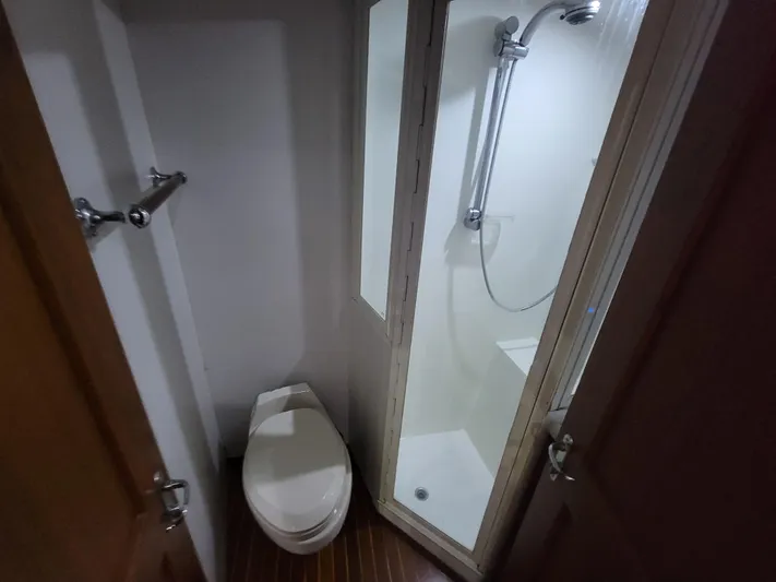  Yacht Photos Pics Bathroom interior of 1998 Buddy Davis 65 Carolina Custom yacht with shower and toilet.