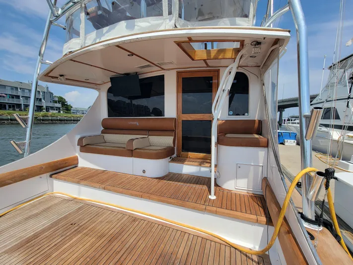  Yacht Photos Pics 1998 Buddy Davis 65 Carolina Custom yacht with teak deck and seating area.