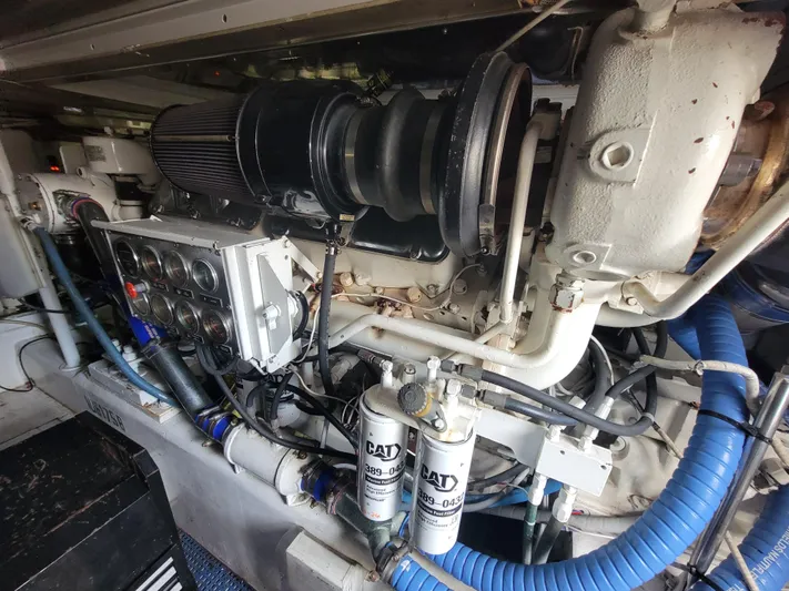  Yacht Photos Pics Engine room of 1998 Buddy Davis 65 Carolina Custom yacht, featuring CAT components.