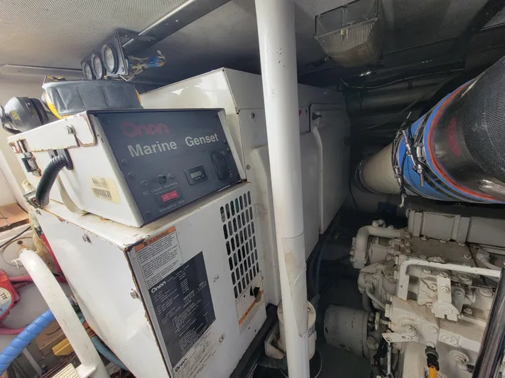  Yacht Photos Pics Engine room of 1998 Buddy Davis 65 Carolina Custom with Onan Marine Genset.