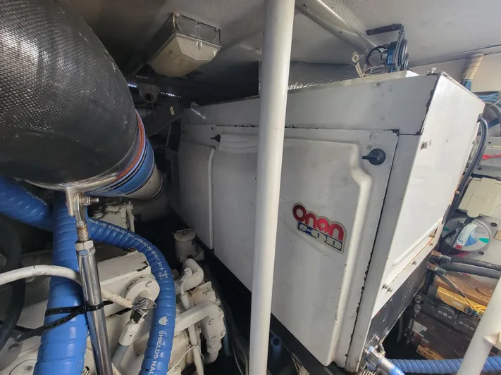  Yacht Photos Pics Engine room of 1998 Buddy Davis 65 Carolina Custom with Onan generator.