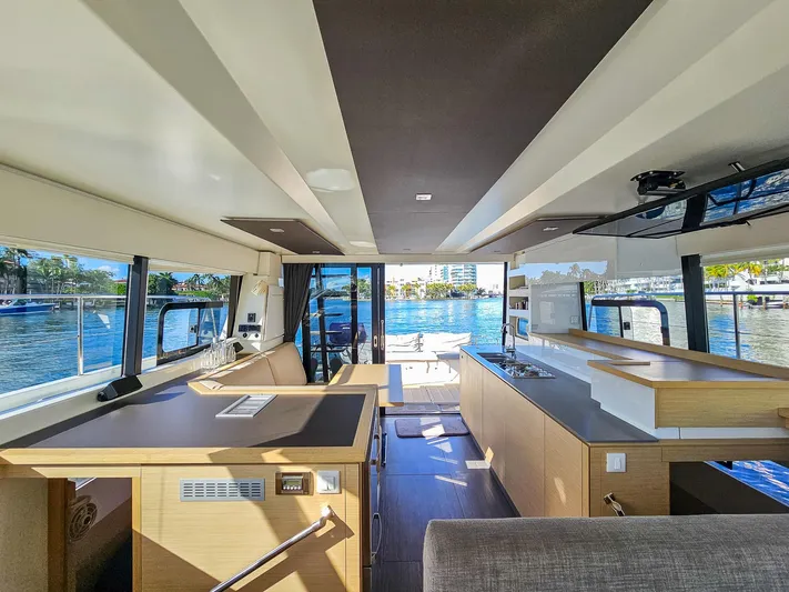Floripa Yacht Photos Pics Interior of 2017 Fountaine Pajot MY 37 yacht with modern design and waterfront view.