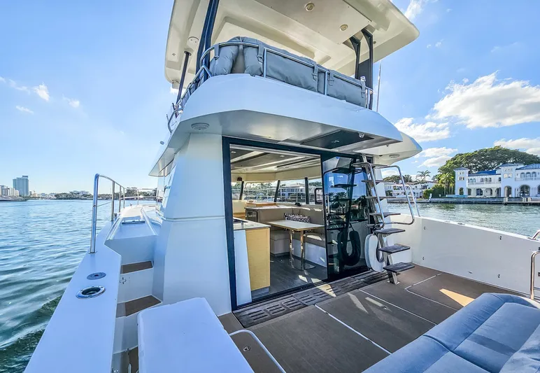 Floripa Yacht Photos Pics 2017 Fountaine Pajot MY 37 yacht with open deck and luxurious interior on a sunny day.