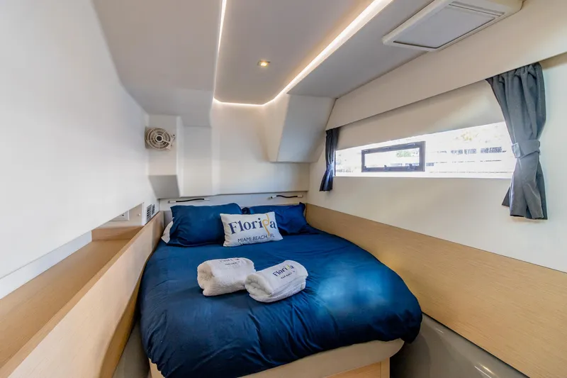 Floripa Yacht Photos Pics Luxurious cabin interior of 2017 Fountaine Pajot MY 37 yacht with cozy bedding.