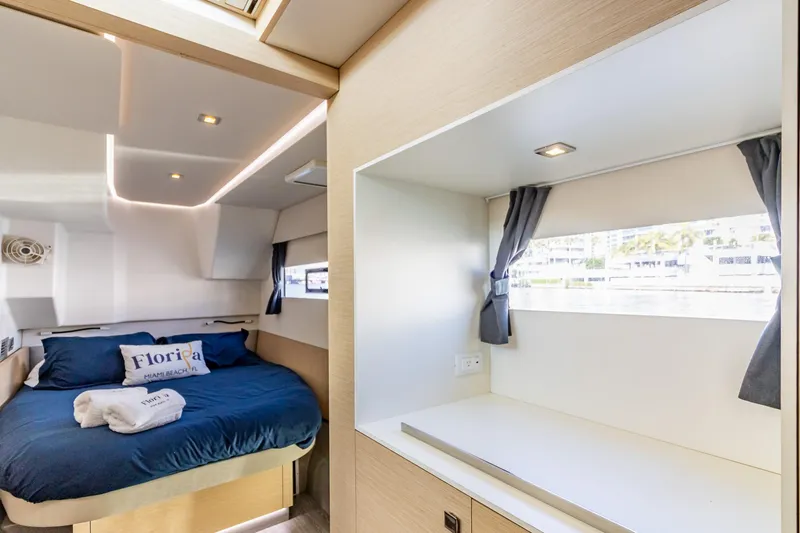 Floripa Yacht Photos Pics Luxurious cabin interior of 2017 Fountaine Pajot MY 37 yacht with cozy bed and window view.