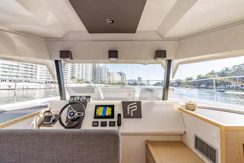 Floripa Yacht Photos Pics Interior helm of 2017 Fountaine Pajot MY 37 yacht with modern navigation equipment.