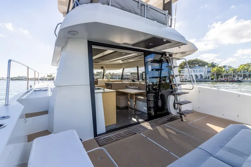 Floripa Yacht Photos Pics 2017 Fountaine Pajot MY 37 yacht with open deck, modern interior, and waterfront view.