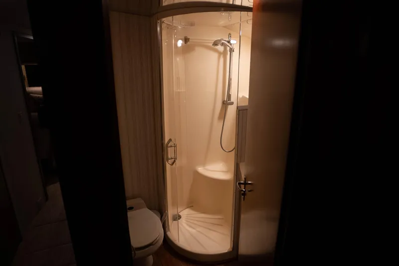 Bloodline Yacht Photos Pics Bathroom with shower in 1990 Hatteras 58 Convertible yacht.