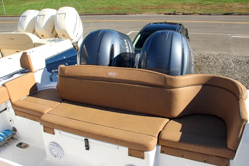  Yacht Photos Pics 2021 Sea Hunt Ultra 275 SE boat with twin outboard engines and tan seating.