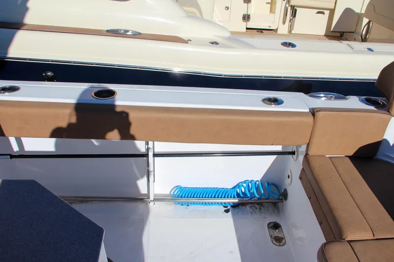  Yacht Photos Pics 2021 Sea Hunt Ultra 275 SE boat interior with seating and storage.