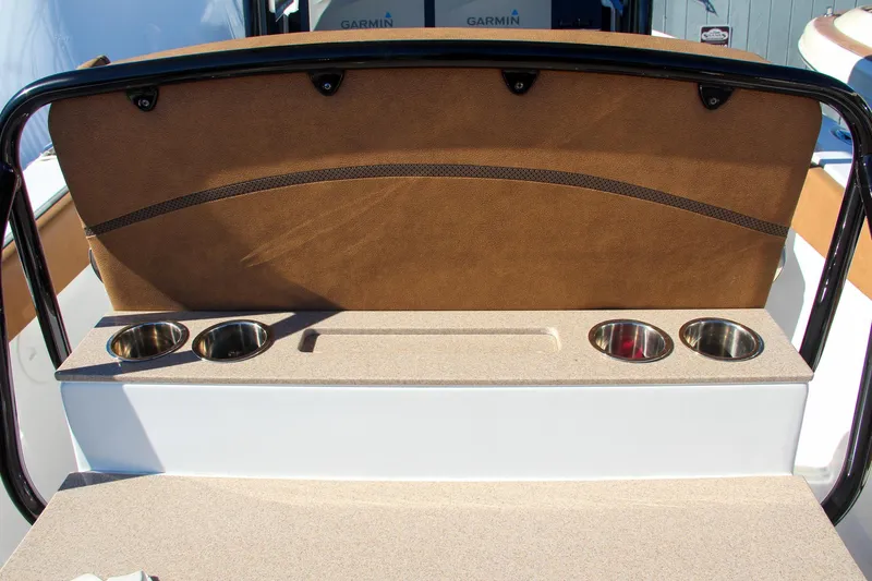  Yacht Photos Pics 2021 Sea Hunt Ultra 275 SE boat interior with cup holders and storage.