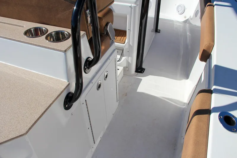  Yacht Photos Pics 2021 Sea Hunt Ultra 275 SE boat interior with seating and storage.