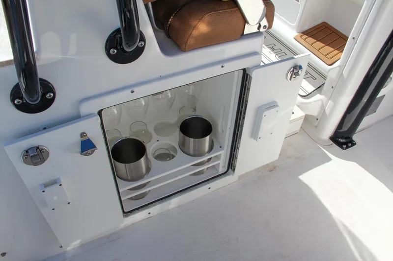  Yacht Photos Pics 2021 Sea Hunt Ultra 275 SE boat with open storage compartment.