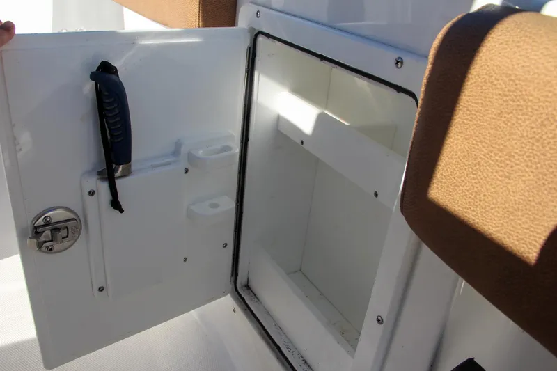 Yacht Photos Pics Open storage compartment on a 2021 Sea Hunt Ultra 275 SE boat.