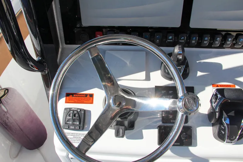  Yacht Photos Pics 2021 Sea Hunt Ultra 275 SE boat steering wheel and control panel.