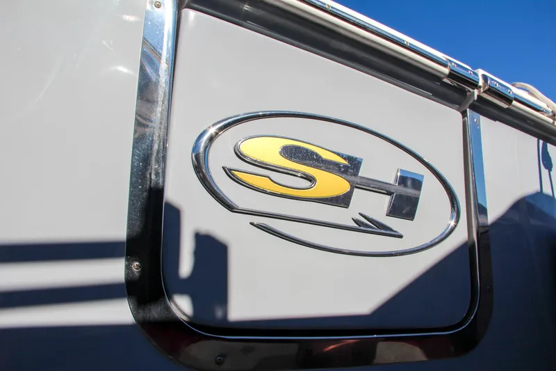  Yacht Photos Pics 2021 Sea Hunt Ultra 275 SE logo on boat exterior.