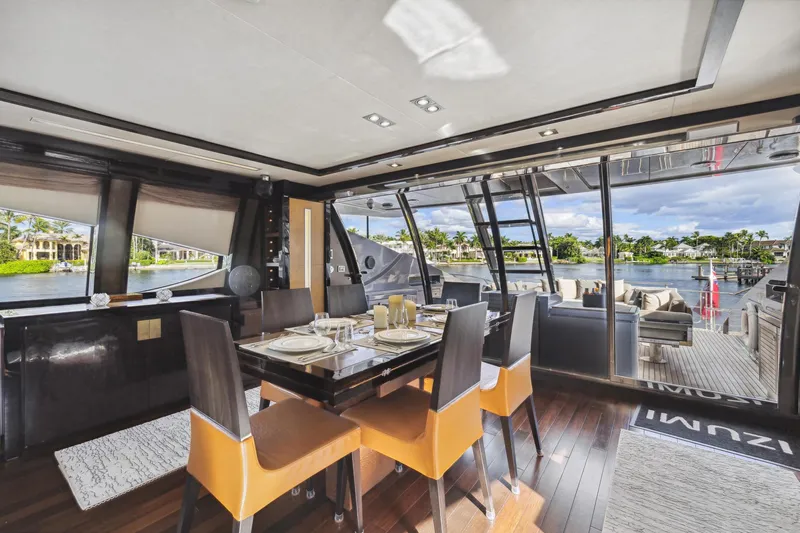 Izumi Yacht Photos Pics Luxurious dining area on the 2008 Palmer Johnson 120 Sports Cruiser yacht.