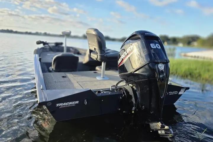 2020 Tracker Pro Team 175 TF boat with Mercury 60 engine on a serene lake.