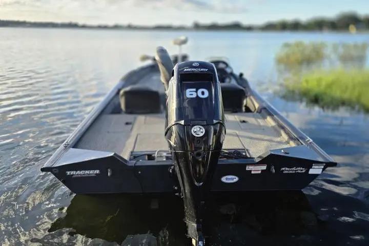 2020 Tracker Pro Team 175 TF boat with Mercury 60 engine on a serene lake.