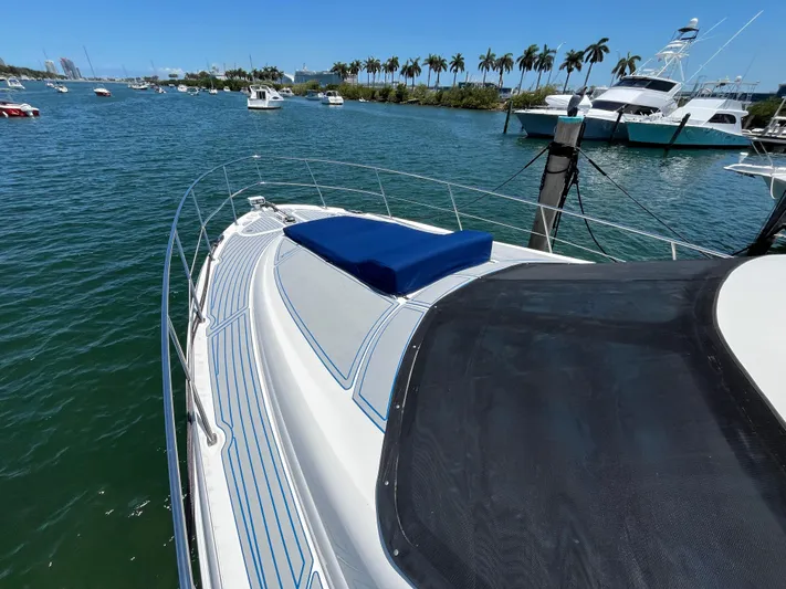 Lazy Days Yacht Photos Pics 2009 Sea Ray 44 Sedan Bridge yacht docked in a marina.