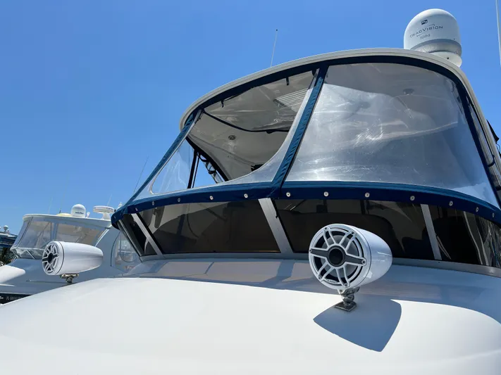 Lazy Days Yacht Photos Pics 2009 Sea Ray 44 Sedan Bridge yacht with clear enclosure and speakers.