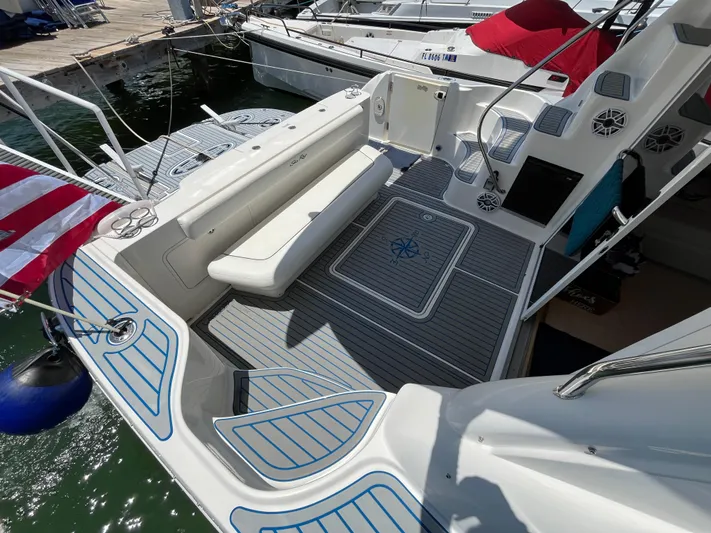 Lazy Days Yacht Photos Pics 2009 Sea Ray 44 Sedan Bridge yacht with spacious deck and seating area.