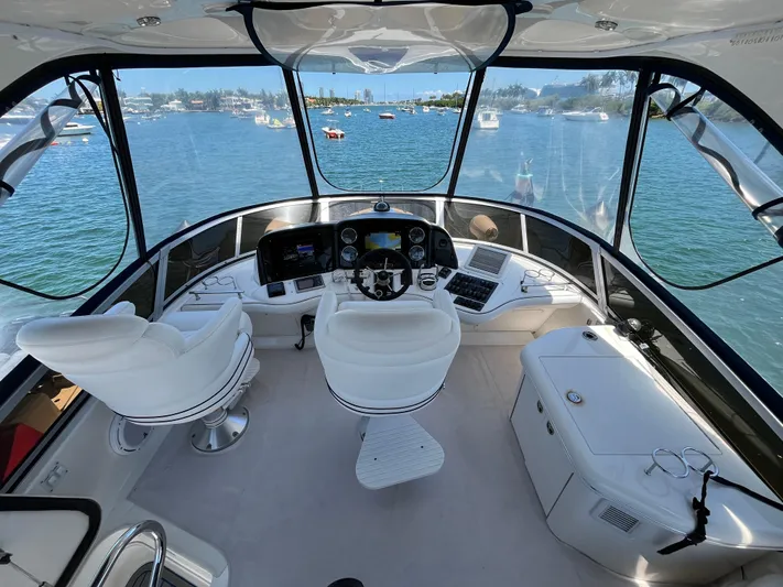 Lazy Days Yacht Photos Pics 2009 Sea Ray 44 Sedan Bridge helm with panoramic water view.