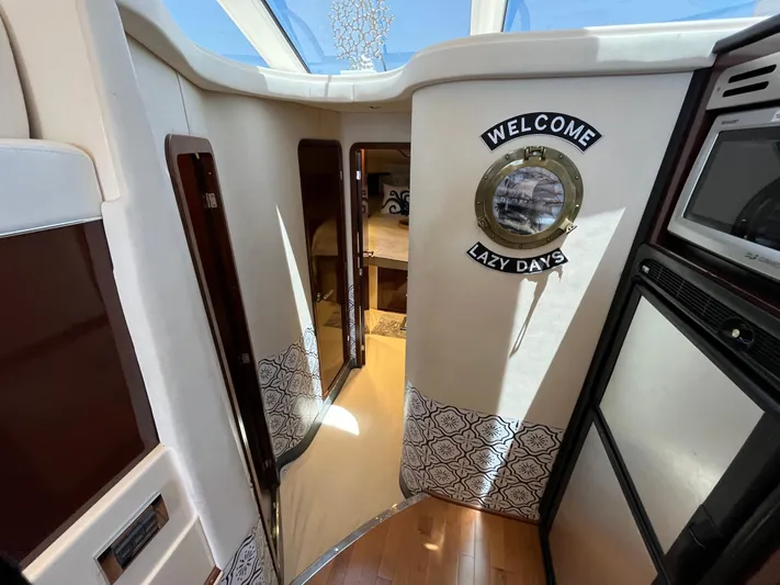 Lazy Days Yacht Photos Pics Interior of 2009 Sea Ray 44 Sedan Bridge yacht with Welcome Lazy Days sign.