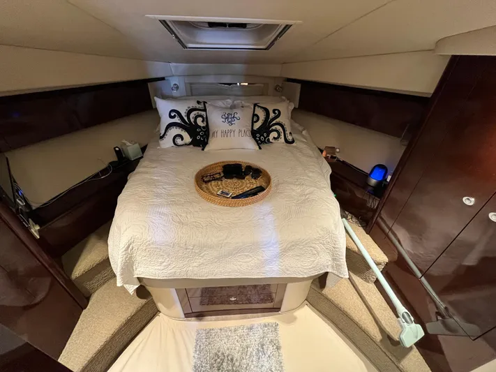 Lazy Days Yacht Photos Pics Luxurious bedroom in 2009 Sea Ray 44 Sedan Bridge yacht with elegant bedding.