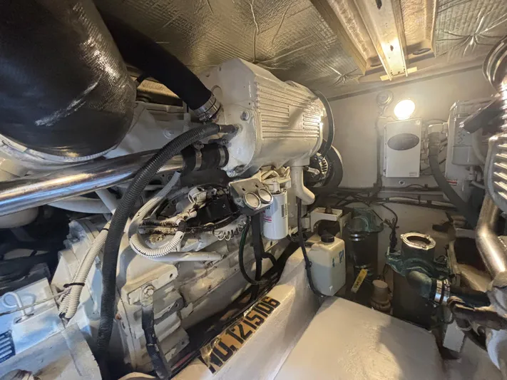 Lazy Days Yacht Photos Pics Engine room of a 2009 Sea Ray 44 Sedan Bridge yacht.