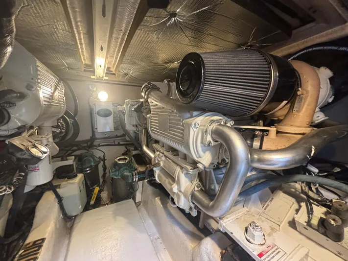 Lazy Days Yacht Photos Pics Engine room of a 2009 Sea Ray 44 Sedan Bridge yacht.