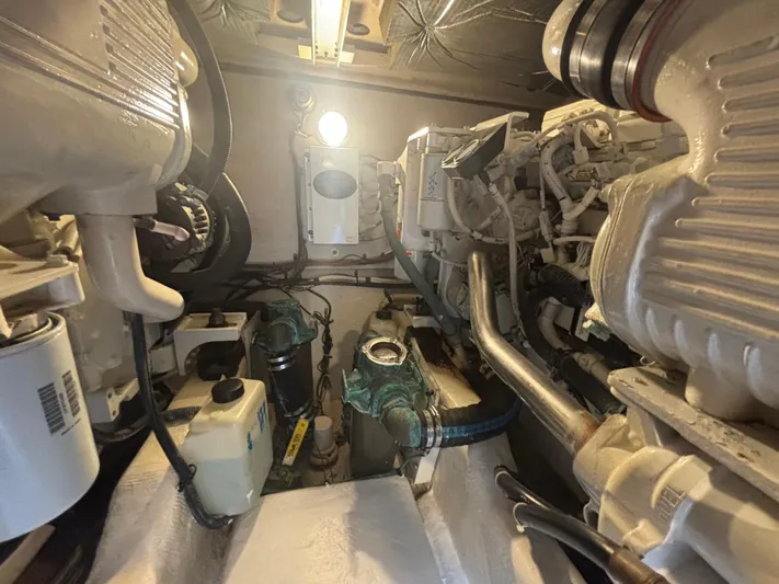 Lazy Days Yacht Photos Pics Engine room of a 2009 Sea Ray 44 Sedan Bridge yacht.