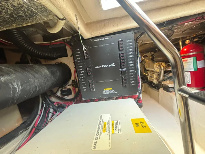 Lazy Days Yacht Photos Pics Electrical panel and engine room of a 2009 Sea Ray 44 Sedan Bridge yacht.