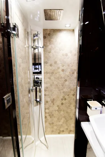 Bugsy Yacht Photos Pics Luxurious bathroom in 2020 Galeon 550 Fly yacht with modern shower design.