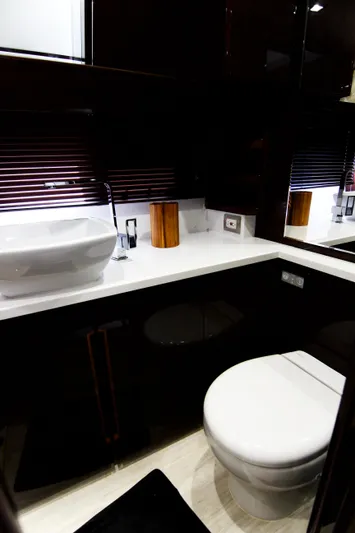 Bugsy Yacht Photos Pics Luxury bathroom interior of 2020 Galeon 550 Fly yacht with modern fixtures.