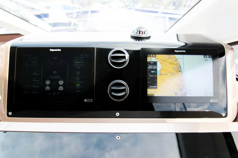 Bugsy Yacht Photos Pics Dashboard of 2020 Galeon 550 Fly yacht with dual Raymarine displays.
