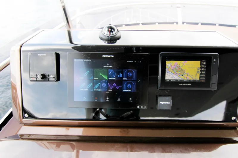 Bugsy Yacht Photos Pics Control panel of 2020 Galeon 550 Fly yacht with navigation displays.