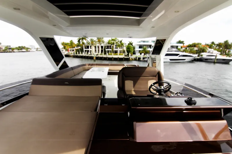 Bugsy Yacht Photos Pics Luxurious 2020 Galeon 550 Fly yacht interior with waterfront view.