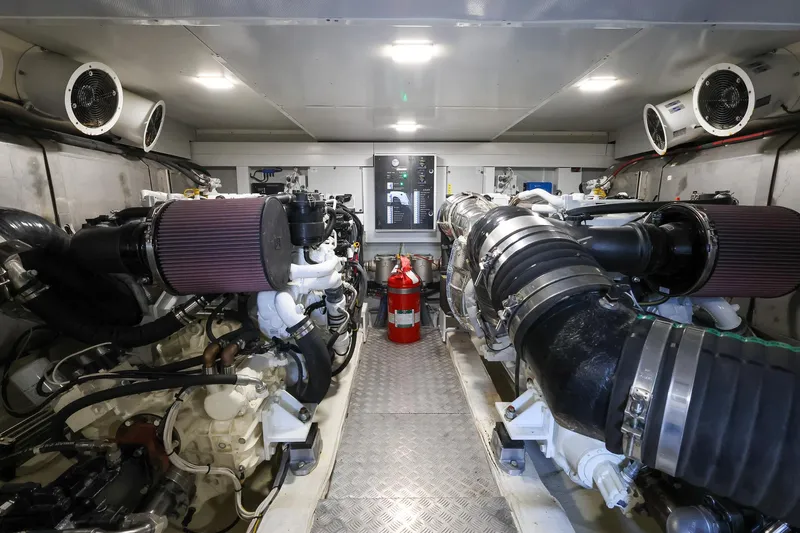 Mas Que Nada Yacht Photos Pics Engine room of 2021 Greenline OceanClass 68 yacht, featuring advanced machinery and ventilation systems.