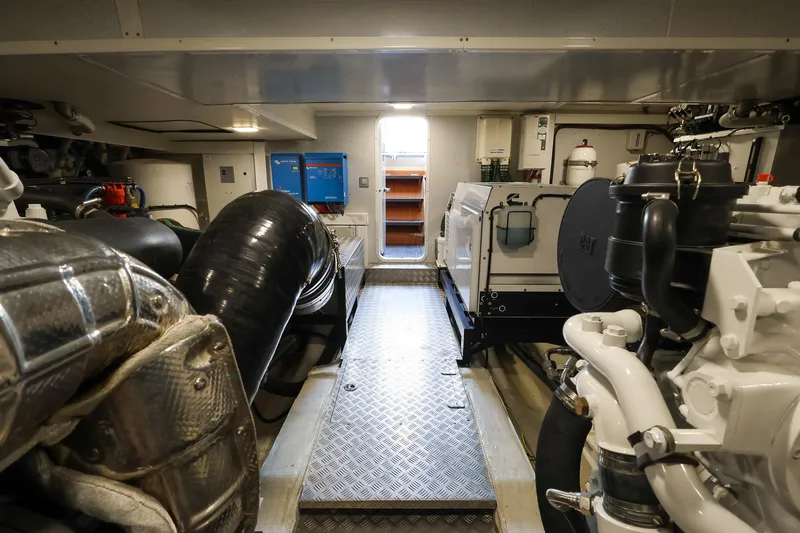 Mas Que Nada Yacht Photos Pics Engine room of 2021 Greenline OceanClass 68 yacht, showcasing machinery and equipment.