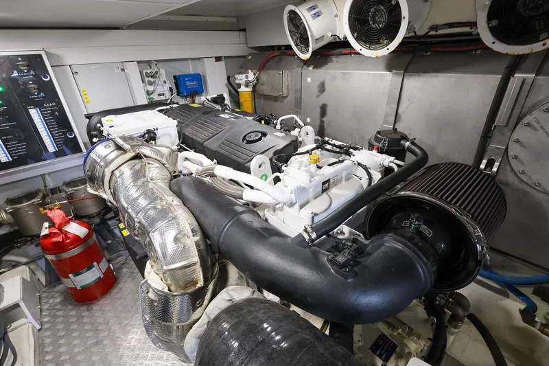 Mas Que Nada Yacht Photos Pics Engine room of 2021 Greenline OceanClass 68 yacht, featuring advanced machinery and safety equipment.